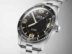 Oris Divers Sixty-Five 60th Anniversary Edition Automatik Edelstahl 40mm schwarzes Zifferblatt Metallband – Herrenuhren Uhr ohne Datum aus Edelstahl. Das Gehäuse ist rund und silber. Das Edelstahlarmband ist silber. Das Zifferblatt ist arabisch Index und schwarz. – Ansicht 3
