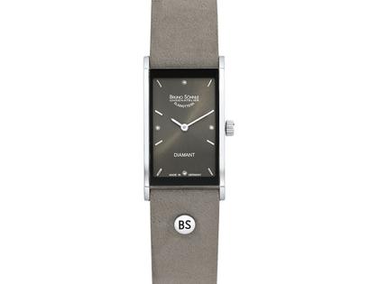 Bruno Söhnle Glashütte Thalia III Edelstahl graues Zifferblatt Diamanten graues Lederband – Damenuhren Uhr ohne Datum aus Edelstahl. Das Gehäuse ist rechteckig und silber. Das Lederarmband ist grau. Das Zifferblatt ist ein Index in grau.