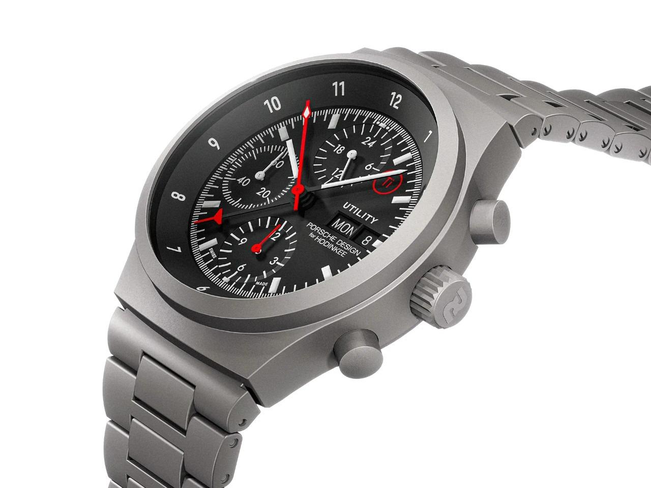 Porsche Design Chronograph 1 - Utility Hodinkee 2026 Limited Edition Automatik Titan 41mm schwarzes Zifferblatt Titanband und Lederband – Herrenuhren Chronograph aus Leder, Titan und Titancarbid beschichtet. Das Gehäuse ist rund und grau. Das Titanarmband ist grau. Das Zifferblatt ist ein Index in schwarz. – Ansicht 5