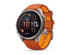Garmin Fenix 9 Pro inReach Titan 47mm digitales Display orangefarbenes Silikonband – Herrenuhren Uhr Multifunktion aus Kautschuk und Titan. Das Gehäuse ist rund und grau. Das Kautschuk / Kunststoff / Silikon Armband ist orange. Das Zifferblatt ist digital und schwarz. – Ansicht 2
