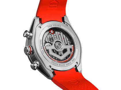 TAG Heuer Carrera Chronograph Extreme Sport Automatik Titan 44mm skelettiertes Zifferblatt oranges Kautschukband – Herrenuhren Chronograph aus Keramik und Titan. Das Gehäuse ist rund und silber. Das Kautschuk / Kunststoff / Silikon Armband ist orange. Das Zifferblatt ist ein Index in orange. – Ansicht 2