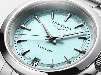 Longines Conquest Quarz Edelstahl 34mm blaues Zifferblatt Metallband – Damenuhren Uhr mit Datum aus Edelstahl. Das Gehäuse ist rund und silber. Das Edelstahlarmband ist silber. Das Zifferblatt ist ein Index in blau. – Ansicht 2