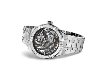 Maurice Lacroix Aikon Skeleton Automatik Edelstahl 45mm skelettiertes Zifferblatt Metallband – Herrenuhren Uhr ohne Datum aus Edelstahl. Das Gehäuse ist rund und silber. Das Edelstahlarmband ist silber. Das Zifferblatt ist ein Index in schwarz. – Ansicht 2