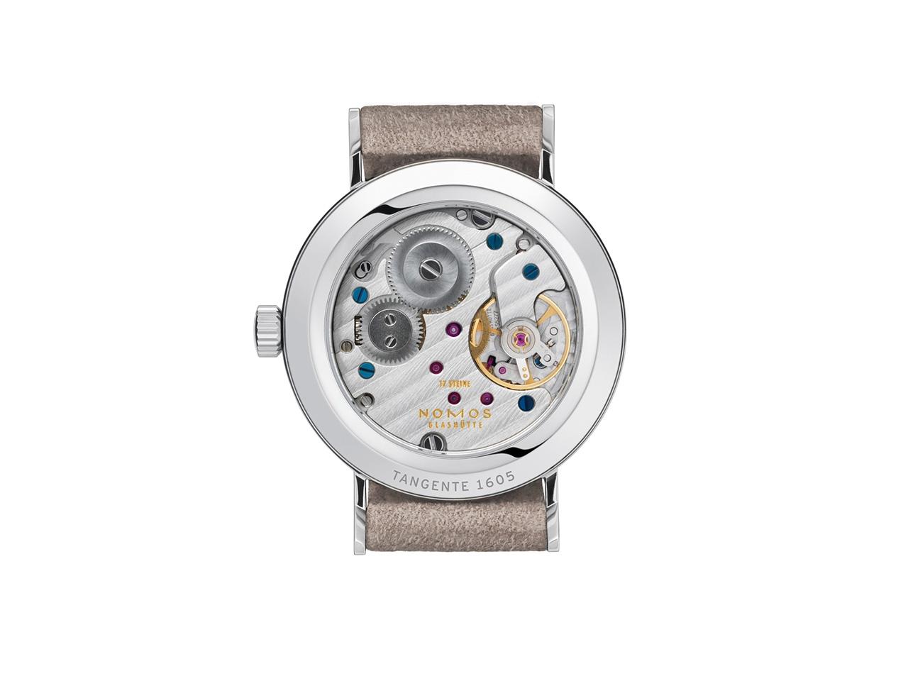 Nomos Glashütte Tangente 33 Handaufzug Edelstahl 33mm graues Zifferblatt beiges Lederband Glasboden – Damenuhren Uhr ohne Datum aus Edelstahl und Leder. Das Gehäuse ist rund und silber. Das Lederarmband ist beige. Das Zifferblatt ist arabisch Index und grau. – Ansicht 2