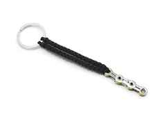 Juwelier Roller | Atelier BikeChains Fahrradketten-Schüsselanhänger mit schwarzem Textilband – Weitere Accessoires Schlüsselanhänger in schwarz und aus Titan.
