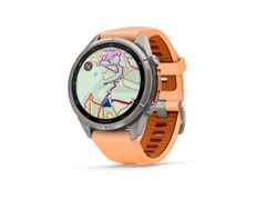 Garmin Fenix 9 Pro inReach Titan 43mm digitales Display orangefarbenes Silikonband – Herrenuhren Uhr Multifunktion aus Kautschuk und Titan. Das Gehäuse ist rund und grau. Das Kautschuk / Kunststoff / Silikon Armband ist orange. Das Zifferblatt ist digital und schwarz. – Ansicht 2