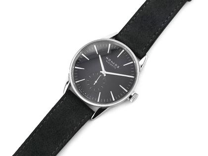 Nomos Glashütte Zürich Automatik Edelstahl 40mm graues Zifferblatt Lederband Ref. 803 Full Set mit Garantie Occasion – Herrenuhren Uhr ohne Datum aus Edelstahl. Das Gehäuse ist rund und silber. Das Lederarmband ist anthrazit. Das Zifferblatt ist ein Index in anthrazit. – Ansicht 4