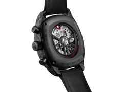 TAG Heuer Monza Flyback Chronometer Automatik Carbon 42mm skelettiertes Zifferblatt schwarzes Textilband – Herrenuhren Chronograph aus DLC beschichtet, Edelstahl, Carbon und Leder. Das Gehäuse ist quadratisch und schwarz. Das Lederarmband ist schwarz. Das Zifferblatt ist ein Index in grau. – Ansicht 4