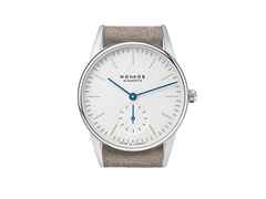 Nomos Glashütte Orion 33 Handaufzug Edelstahl 33mm weißes Zifferblatt braunes Lederband – Damenuhren Uhr ohne Datum aus Edelstahl und Leder. Das Gehäuse ist rund und silber. Das Lederarmband ist beige. Das Zifferblatt ist ein Index in weiß. – Ansicht 2