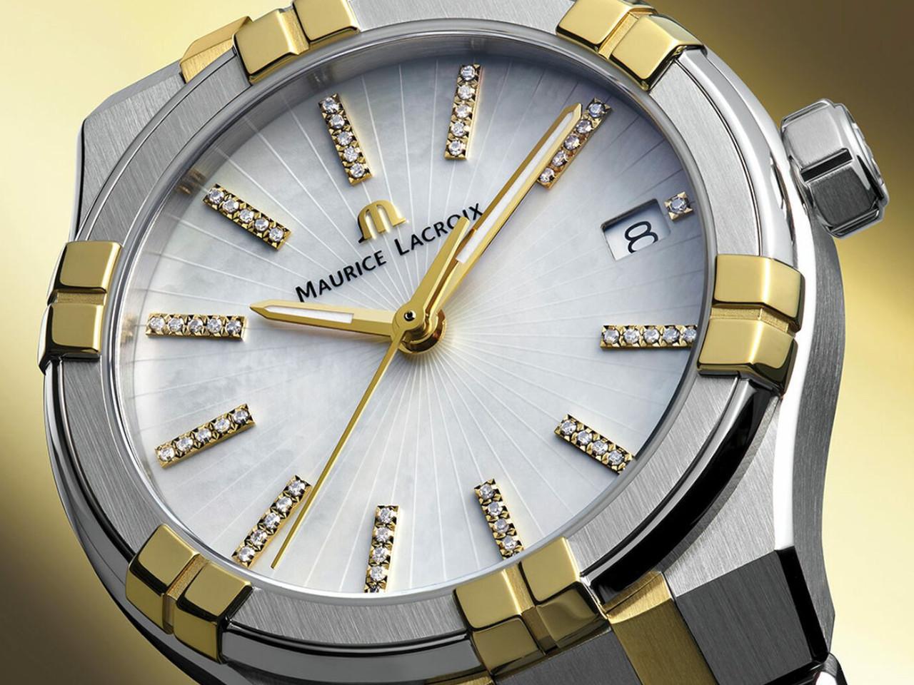 Maurice Lacroix Aikon Quartz Duotone Edelstahl 35mm weißes Zifferblatt zweifarbiges Metallband – Damenuhren Uhr mit Datum aus Edelstahl, PVD beschichtet und vergoldet. Das Gehäuse ist rund und silber-roségold. Das vergoldetes Edelstahlarmband ist silber-gelbgold. Das Zifferblatt ist ein Index in weiß. – Ansicht 2