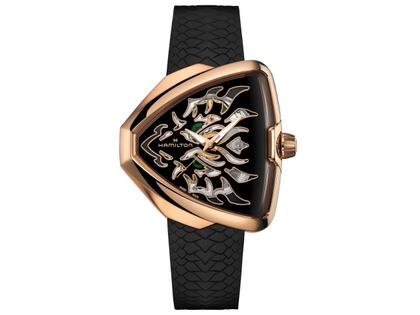 Hamilton Ventura Elvis80 Skeleton Dragon Auto Edelstahl PVD-Roségold 42x45mm schwarzes Zifferblatt Kautschukband – Damenuhren Uhr ohne Datum aus Edelstahl, Kautschuk und PVD beschichtet. Das Gehäuse ist sonstige Form und roségold. Das Kautschuk / Kunststoff / Silikon Armband ist schwarz. Das Zifferblatt ist ohne Zeichen und schwarz.