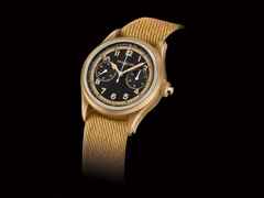 Montblanc 1858 Automatic Chronograph Monopusher Limited Edition 1858 Bronze – Herrenuhren Chronograph aus Bronze. Das Gehäuse ist rund und roségold. Das Textilarmband ist beige. Das Zifferblatt ist arabisch Index und schwarz. – Ansicht 2
