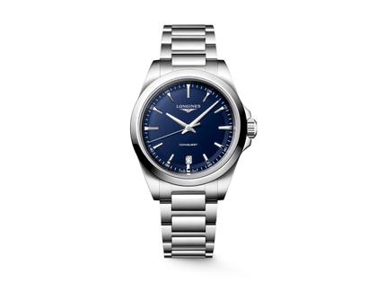 Longines Conquest Quarz Edelstahl 38mm blaues Zifferblatt Metallband – Herrenuhren Uhr mit Datum aus Edelstahl. Das Gehäuse ist rund und silber. Das Edelstahlarmband ist silber. Das Zifferblatt ist ein Index in blau.