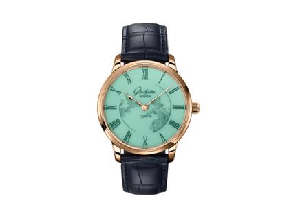 Herrenuhren Uhr ohne Datum aus 750 Rotgold und Leder. Das Gehäuse ist rund und roségold. Das Lederarmband Kroko / Alligator ist blau. Das Zifferblatt ist römisch und grün.
