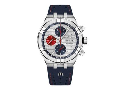 Maurice Lacroix Aikon Chronograph Mahindra Racing Automatik Edelstahl 44mm silbernes Zifferblatt blaues Lederband – Herrenuhren Chronograph aus Edelstahl. Das Gehäuse ist rund und silber. Das Lederarmband ist blau. Das Zifferblatt ist ein Index in weiß.