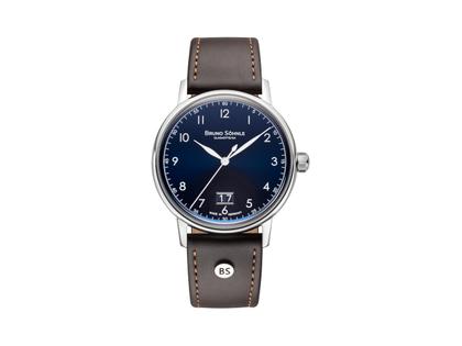 Bruno Söhnle Glashütte Bergamo Big Quarz Edelstahl 39mm blaues Zifferblatt braunes Lederband – Herrenuhren Uhr mit Datum aus Edelstahl. Das Gehäuse ist rund und silber. Das Lederarmband ist braun. Das Zifferblatt ist arabisch Index und blau.