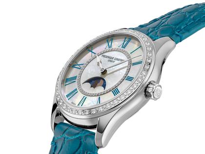 Frederique Constant Classics Elegance Luna Automatik Edelstahl 36mm weißes Zifferblatt blaues Lederband – Damenuhren Uhr ohne Datum aus Edelstahl und Leder. Das Gehäuse ist rund und silber. Das Lederarmband ist blau. Das Zifferblatt ist römisch und weiß. – Ansicht 2