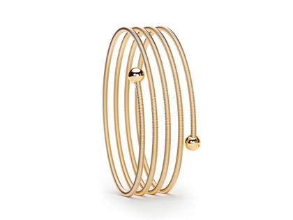 Niessing Colette C Embrace Armreif 4-fach Fine Rose – Armschmuck Armreif aus 750 Gelbgold.