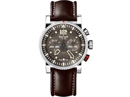 Hanhart PRIMUS Pilot Chronograph Automatik Edelstahl 44mm braunes Zifferblatt braunes Lederband – Herrenuhren Chronograph aus Edelstahl. Das Gehäuse ist rund und silber. Das Lederarmband ist braun. Das Zifferblatt ist arabisch Index und braun.