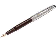 Montblanc Le Petit Prince Aviator Doué Classique  Füllfederhalter – Schreibgeräte Füllfederhalter in braun und aus 750 Gelbgold, Edelharz, platiniert und rhodiniert.