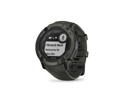 Garmin Instinct 2X Solar faserverstärktes Polymer moosgrün 50 mm Kautschukband moosgrün – Damenuhren Uhr Multifunktion aus Kautschuk und Kunststoff. Das Gehäuse ist rund und grün. Das Kautschuk / Kunststoff / Silikon Armband ist grün. Das Zifferblatt ist digital und schwarz. – Ansicht 2