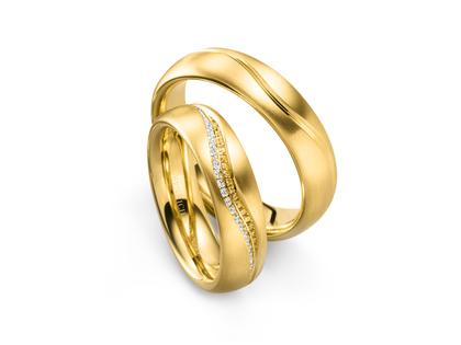 Henrich & Denzel Reflex Trauringpaar Gelbgold gewölbt mit Brillanten 0,090ct – Ringe Trauring mit Besatz in gelbgold und aus 750 Gelbgold.