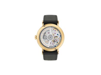 Nomos Glashütte Tangente Gold Neomatik Ruthenium Automatik Gelbgold 35mm schwarzes Zifferblatt schwarzes Lederband – Damenuhren Uhr ohne Datum aus 750 Gelbgold und Leder. Das Gehäuse ist rund und gelbgold. Das Lederarmband ist schwarz. Das Zifferblatt ist arabisch Index und schwarz. – Ansicht 2