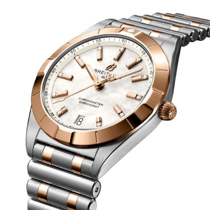 Breitling Chronomat 32 Quarz Edelstahl weißes Zifferblatt mit Brillanten zweifarbiges Metallband – Damenuhren Uhr mit Datum aus 750 Rotgold und Edelstahl. Das Gehäuse ist rund und roségold. Das Edelstahlarmband mit Gold ist silber-roségold. Das Zifferblatt ist ein Index in weiß. – Ansicht 3