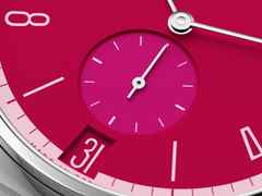 Nomos Glashütte Tangente 38 Datum "175 Years Watchmaking - Chili" Handaufzug Edelstahl pinkes Zifferblatt graues Textilband Glasboden – Herrenuhren Uhr mit Datum aus Edelstahl. Das Gehäuse ist rund und silber. Das Textilarmband ist grau. Das Zifferblatt ist arabisch Index und pink. – Ansicht 6