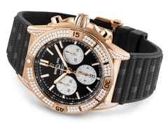 Breitling Chronomat B01 42 Automatik Rotgold schwarzes Zifferblatt mit Brillanten 1,30ct schwarzes Kautschukband – Herrenuhren Chronograph aus 750 Rotgold und Kautschuk. Das Gehäuse ist rund und roségold. Das Kautschuk / Kunststoff / Silikon Armband ist schwarz. Das Zifferblatt ist ein Index in schwarz. – Ansicht 3