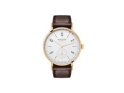 Nomos Glashütte Tangente Gold neomatik 38 Update Doré Automatik Edelstahl 38mm weißes Zifferblatt braunes Lederband – Herrenuhren Uhr mit Datum aus 750 Gelbgold und Leder. Das Gehäuse ist rund und gelbgold. Das Lederarmband ist braun. Das Zifferblatt ist arabisch Index und weiß.