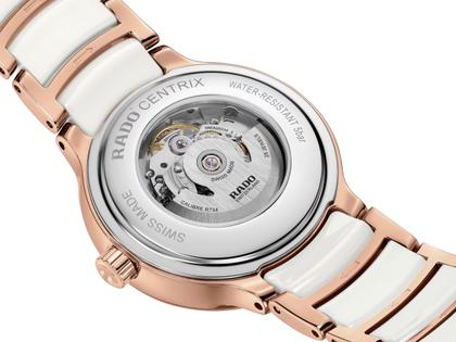 Rado Centrix Diamonds Automatik Open Heart Edelstahl Roségold-PVD 35mm weißes Zifferblatt mit Brillanten Metallband – Damenuhren Uhr ohne Datum aus Edelstahl, Keramik und PVD beschichtet. Das Gehäuse ist rund und roségold. Das Keramikarmband ist weiß. Das Zifferblatt ist ein Index in weiß. – Ansicht 4