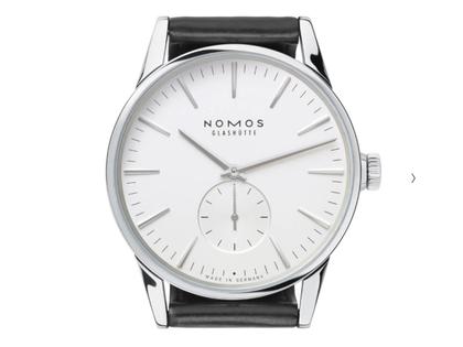 Nomos Glashütte Zürich Automatik Edelstahl 40mm weißes Zifferblatt schwarzes Lederband Stahlboden – Herrenuhren Uhr ohne Datum aus Edelstahl. Das Gehäuse ist rund und silber. Das Lederarmband ist schwarz. Das Zifferblatt ist ein Index in silber. – Ansicht 2