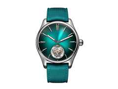 H. Moser & Cie. Pioneer Tourbillon Fumé Blue Lagoon Automatik Edelstahl 42,8mm türkises Zifferblatt türkises Textilband – Herrenuhren Uhr ohne Datum aus Edelstahl. Das Gehäuse ist rund und silber. Das Lederarmband Kroko / Alligator ist grün. Das Zifferblatt ist ein Index in grün.