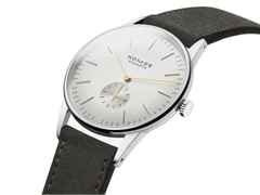 Nomos Glashütte Orion 38 Silber Handaufzug Edelstahl 38mm silberfarbenes Zifferblatt braunes Lederband Glasboden – Herrenuhren Uhr ohne Datum aus Edelstahl. Das Gehäuse ist rund und silber. Das Lederarmband ist grau. Das Zifferblatt ist ein Index in silber. – Ansicht 3