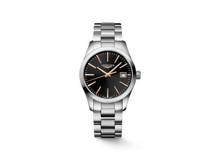 Longines Conquest Classic Quarz Edelstahl 34mm schwarzes Zifferblatt Metallband – Damenuhren Uhr mit Datum aus Edelstahl. Das Gehäuse ist rund und silber. Das Edelstahlarmband ist silber. Das Zifferblatt ist ein Index in schwarz.
