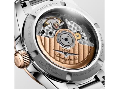 Longines Conquest Automatik Edelstahl 34mm grünes Zifferblatt Metallband – Damenuhren Uhr mit Datum aus 750 Rotgold und Edelstahl. Das Gehäuse ist rund und silber. Das Edelstahlarmband ist silber. Das Zifferblatt ist ein Index in grün. – Ansicht 4
