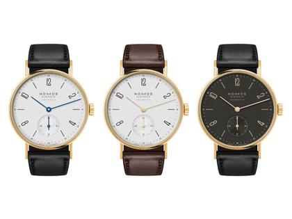 Nomos Glashütte Tangente Gold Neomatik Automatik Gelbgold 35mm weißes Zifferblatt schwarzes Lederband – Damenuhren Uhr ohne Datum aus 750 Gelbgold und Leder. Das Gehäuse ist rund und gelbgold. Das Lederarmband ist schwarz. Das Zifferblatt ist arabisch Index und weiß. – Ansicht 8