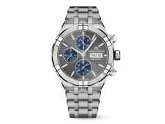 Maurice Lacroix Aikon Chronograph Automatik Titan 44mm graues Zifferblatt Metallband – Herrenuhren Chronograph aus Titan. Das Gehäuse ist rund und silber. Das Edelstahlarmband ist silber. Das Zifferblatt ist ein Index in silber.