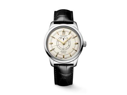 Longines Conquest Heritage Central Power Reserve Automatik Edelstahl 38mm champagnerfarbenes Zifferblatt schwarzes Lederband – Herrenuhren Uhr mit Datum aus Edelstahl und Leder. Das Gehäuse ist rund und silber. Das Lederarmband Kroko / Alligator ist schwarz. Das Zifferblatt ist ein Index in beige.