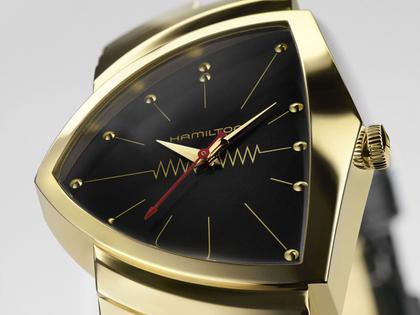 Hamilton Ventura Gold Quartz Limited Edition Gelbgold 33x52mm schwarzes Zifferblatt Lederband – Herrenuhren Uhr ohne Datum aus 585 Gelbgold und Leder. Das Gehäuse ist sonstige Form und gelbgold. Das Lederarmband ist schwarz. Das Zifferblatt ist ein Index in schwarz. – Ansicht 5