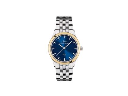 Sinn Spezialuhren 434 St GG B Quarz Edelstahl 34mm blaues Zifferblatt Metallband – Damenuhren Uhr ohne Datum aus 750 Gelbgold und Edelstahl. Das Gehäuse ist rund und silber-gelbgold. Das Edelstahlarmband ist silber. Das Zifferblatt ist ein Index in blau.