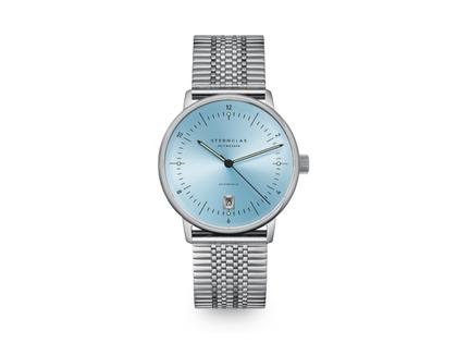 Sternglas Naos Pro Edition Tuxberg Automatik Edelstahl 38mm blaues Zifferblatt Metallband – Herrenuhren Uhr mit Datum aus Edelstahl und Leder. Das Gehäuse ist rund und silber. Das Edelstahlarmband ist silber. Das Zifferblatt ist arabisch Index und blau.