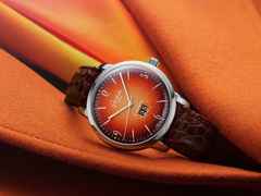 Glashütte Original Sixties Edelstahl   orange Panoramadatum – Herrenuhren Uhr mit Datum aus Edelstahl. Das Gehäuse ist rund und silber. Das Lederarmband Kroko / Alligator ist braun. Das Zifferblatt ist arabisch Index und orange. – Ansicht 2