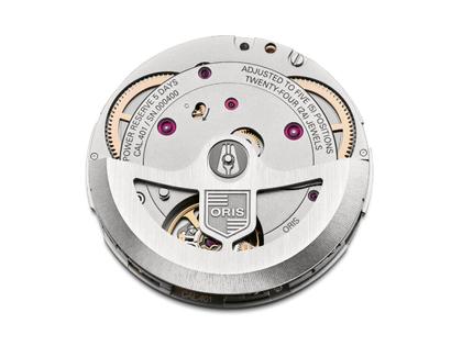 Oris Carl Brashear Limited Edition Automatik Bronze 40mm blaues Zifferblatt blaues Textilband – Herrenuhren Uhr ohne Datum aus Bronze. Das Gehäuse ist rund und roségold. Das Textilarmband ist blau. Das Zifferblatt ist ein Index in blau. – Ansicht 5