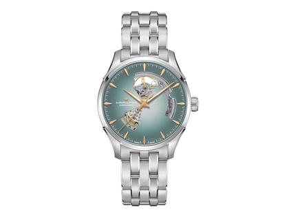 Hamilton Jazzmaster Open Heart Automatik Edelstahl 40mm hellblaues Zifferblatt Metallband – Herrenuhren Uhr ohne Datum aus Edelstahl. Das Gehäuse ist rund und silber. Das Edelstahlarmband ist silber. Das Zifferblatt ist ein Index in blau.