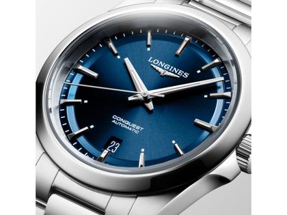 Longines Conquest Automatik Edelstahl 38mm blaues Zifferblatt Metallband – Herrenuhren Uhr mit Datum aus Edelstahl. Das Gehäuse ist rund und silber. Das Edelstahlarmband ist silber. Das Zifferblatt ist ein Index in blau. – Ansicht 2
