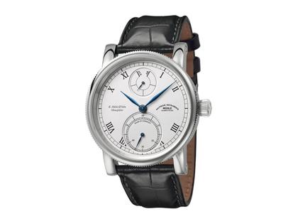 Mühle Glashütte Robert Mühle Auf/Ab Handaufzug Edelstahl 44mm silbernes Zifferblatt schwarzes Lederband – Herrenuhren Uhr ohne Datum aus Edelstahl. Das Gehäuse ist rund und silber. Das Lederarmband Kroko / Alligator ist schwarz. Das Zifferblatt ist römisch und silber.