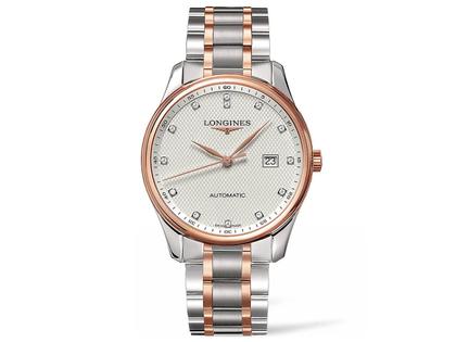 Herrenuhren Uhr mit Datum aus Edelstahl und IP beschichtet. Das Gehäuse ist rund. Das Armband ist ein Edelstahlarmband mit Gold. Der Zifferblatt ist ein Index.
