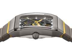 Rado Anatom Automatik Keramik 32,5mm skelettiertes Zifferblatt graues Kautschukband – Damenuhren Uhr ohne Datum aus Edelstahl, Kautschuk, Keramik und PVD beschichtet. Das Gehäuse ist rechteckig und grau. Das Kautschuk / Kunststoff / Silikon Armband ist grau. Das Zifferblatt ist skelettiert und grau. – Ansicht 3
